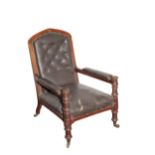 A VICTORIAN OAK AND UPHOLSTERED LIBRARY ARMCHAIR, IN GOTHIC STYLE, POSSIBLY IRISH,