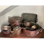 A COLLECTION OF DOMESTIC COPPERWARE, INCLUDING PANS AND A KETTLE,