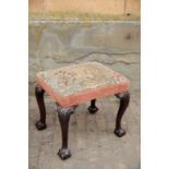 A CARVED MAHOGANY AND BERLIN WOOLWORK UPHOLSTERED STOOL, IN GEORGE III STYLE,