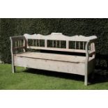 A CONTINENTAL PINE COFFER BENCH,