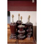 A PAIR OF MAHOGANY TABLE LAMPS, IN REGENCY TASTE,