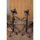 A PAIR OF PAINTED WROUGHT IRON ANDIRONS, IN ART NOUVEAU STYLE,