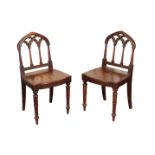A PAIR OF OAK HALL CHAIRS IN GOTHIC STYLE,
