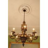 A REGENCE STYLE GILT BRONZE EIGHT LIGHT CHANDELIER,