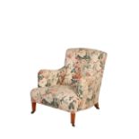 A LATE VICTORIAN OR EDWARDIAN UPHOLSTERED ARMCHAIR, BY HOWARD & SONS,