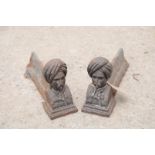 A PAIR OF VICTORIAN CAST IRON ANDIRONS, CAST AS TURKS' HEADS,
