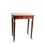 A REGENCY MAHOGANY CHAMBER TABLE, IN THE MANNER OF GILLOWS,