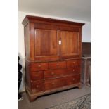 A LATE GEORGE III OAK HOUSEKEEPER'S CUPBOARD,