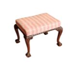 A CARVED AND STAINED HARDWOOD AND UPHOLSTERED STOOL IN GEORGE II STYLE,