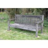 A TEAK GARDEN BENCH,