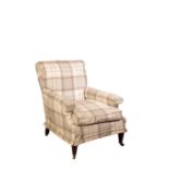 A VICTORIAN UPHOLSTERED ARMCHAIR, IN THE MANNER OF HOWARD & SONS,