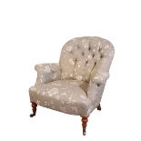 A VICTORIAN UPHOLSTERED ARMCHAIR, PROBABLY BY HOWARD & SONS,