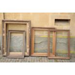 FOUR VARIOUS GILTWOOD AND COMPOSITION PICTURE FRAMES,