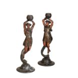 A PAIR OF CONTINENTAL PAINTED SPELTER FIGURAL CANDLEHOLDERS,