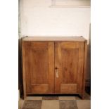 AN OAK 'TOY CUPBOARD', BY HEAL & SON,