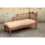 A VICTORIAN OAK DAY BED, IN ARTS AND CRAFTS STYLE AFTER SELWYN, POSSIBLY BY GILLOWS,