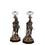 A PAIR OF FINE PATINATED AND PARCEL GILT BRONZE FIGURAL TABLE LAMPS,