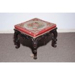 AN IRISH VICTORIAN CARVED MAHOGANY AND BERLIN WOOLWORK UPHOLSTERED STOOL, BY ROBERT STRAHAN,