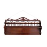 A SET OF VICTORIAN MAHOGANY WALL SHELVES, IN CHIPPENDALE TASTE,