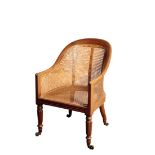 A GEORGE IV MAHOGANY AND CANEWORK LIBRARY BERGERE, PROBABLY BY GILLOWS,