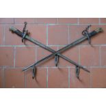 A SET OF VICTORIAN WALL HOOKS FORMED FROM A PAIR OF CROSSED BAYONETS,