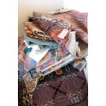 A COLLECTION OF VARIOUS FABRICS, INCLUDING CURTAINS, MIDDLE EASTERN FLATWEAVES, ETC.,