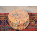A NORTH AFRICAN COLLAGE LEATHER CENTRE POUFFE,