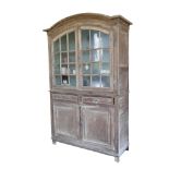 A LARGE CONTINENTAL OAK AND GLAZED SIDE CABINET,
