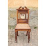 A VICTORIAN OAK HALL CHAIR, IN AESTHETIC STYLE,