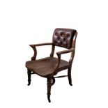 A VICTORIAN MAHOGANY AND LEATHER BACKED ELBOW CHAIR,