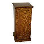 A VICTORIAN SATINWOOD BEDSIDE CUPBOARD, IN THE MANNER OF HOWARD & SONS,