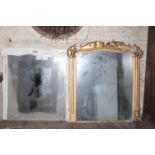 A CARVED AND GILTWOOD FRAMED OVERMANTEL MIRROR,