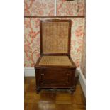 A VICTORIAN MAHOGANY AND CANEWORK COMMODE CHAIR, POSSIBLY BY GILLOWS,