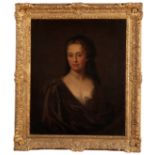 CIRCLE OF SIR GODFREY KNELLER (1646-1723) A portrait of a lady wearing a brown cloak and dark...