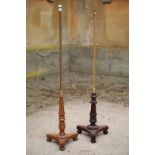 TWO SIMILAR REGENCY MAHOGANY AND BRASS MOUNTED POLE STANDS, IN THE MANNER OF GILLOWS,