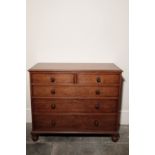 A REGENCY OAK CHEST OF DRAWERS, ATTRIBUTABLE TO GILLOWS,