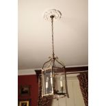 A GILT METAL AND GLAZED CEILING LANTERN IN GEORGE III STYLE,
