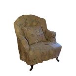 A VICTORIAN UPHOLSTERED ARMCHAIR, BY HOWARD & SONS,