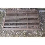 A SUBSTANTIAL VICTORIAN CAST AND WROUGHT IRON BOOT CLEANING GRILLE,