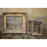 A GILTWOOD AND COMPOSITION PICTURE FRAME IN REGENCE STYLE,