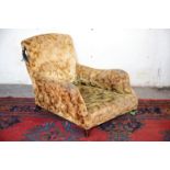 AN UPHOLSTERED ARMCHAIR, BY HOWARD & SONS,