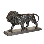AFTER ANTOINE-LOUIS BARYE, (1795 - 1875), A PATINATED BRONZE MODEL OF A LION, 'LION QUI MARCHE' ,