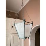 A REGENCY METAL AND GLAZED CEILING LANTERN,