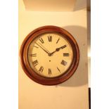 AN OAK FRAMED CIRCULAR WALL TIMEPIECE,