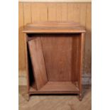 AN OAK OPEN BOOKCASE,