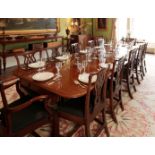 A GEORGE IV MAHOGANY EXTENDING DINING TABLE IN THE MANNER OF GILLOWS,