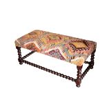 A FRENCH WALNUT AND UPHOLSTERED LONG STOOL,