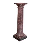 A CONTINENTAL SCAGLIOLA FAUX MARBLE COLUMNAR PEDESTAL,