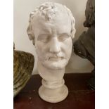 A PAINTED PLASTER BUST OF A ROMAN,