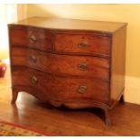 A GEORGE III MAHOGANY SERPENTINE FRONT CHEST OF DRAWERS,